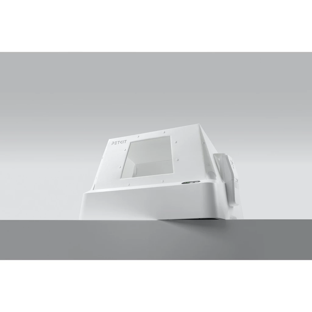 PETKIT Purobot Crystal Duo IA con cubierta blanca, panel frontal transparente, líneas minimalistas y botón lateral; diseño moderno y autolimpieza inteligente