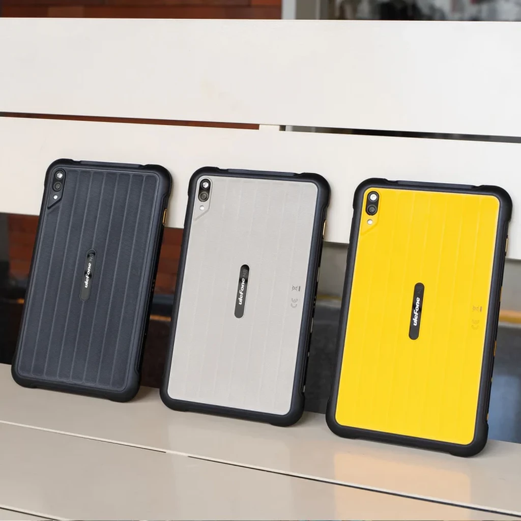 Tablets Ulefone Rugking Pad Pro con carcasa robusta en negro, gris y amarillo, esquinas reforzadas, cámara trasera con flash y acabado estriado antideslizante
