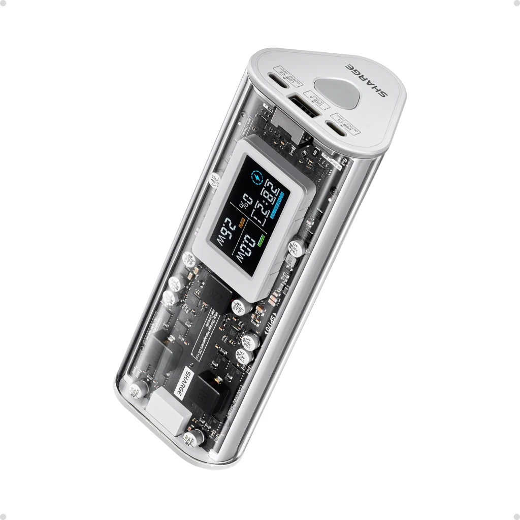 Power bank transparente SHARGE SHARGEEK 170 140W 24000 mAh con carcasa clara, puertos USB-C y USB-A, pantalla inteligente que muestra voltaje, vatios y % de