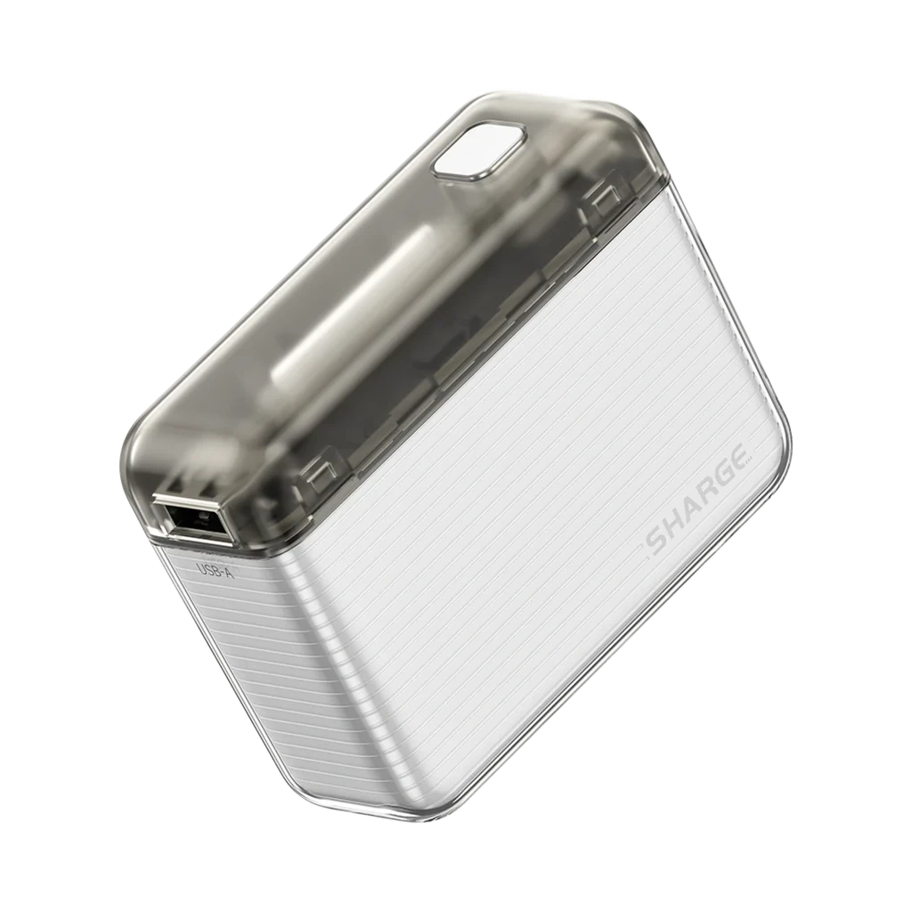 SHARGE Flow 20W 10000 mAh Transparente Power Bank con carcasa translúcida gris, cuerpo estriado blanco, puerto USB y esquinas redondeadas compactas