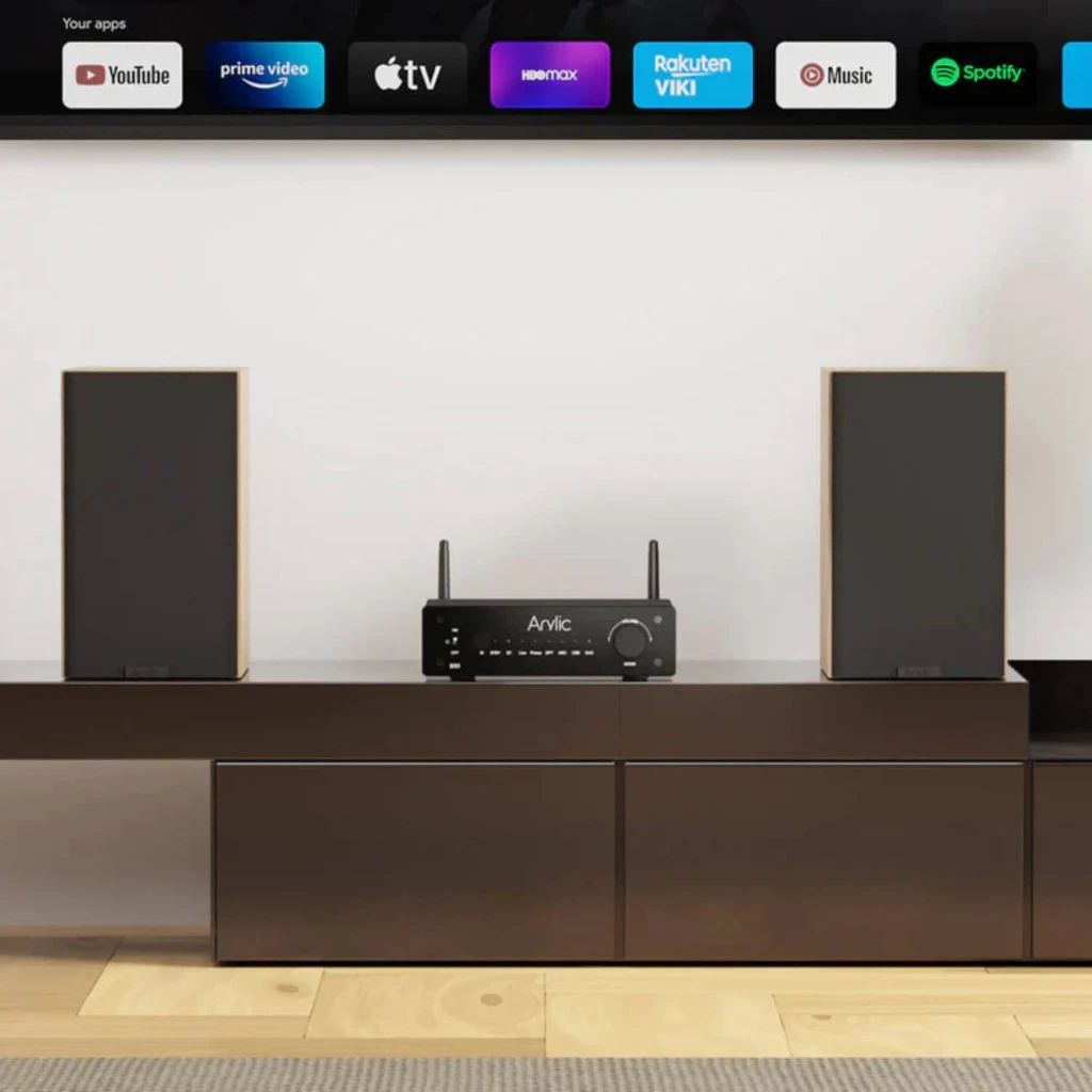 Arylic B50 Amplificador Bluetooth 5.2 negro con perilla grande, antenas duales, botones frontales y panel minimalista entre dos altavoces
