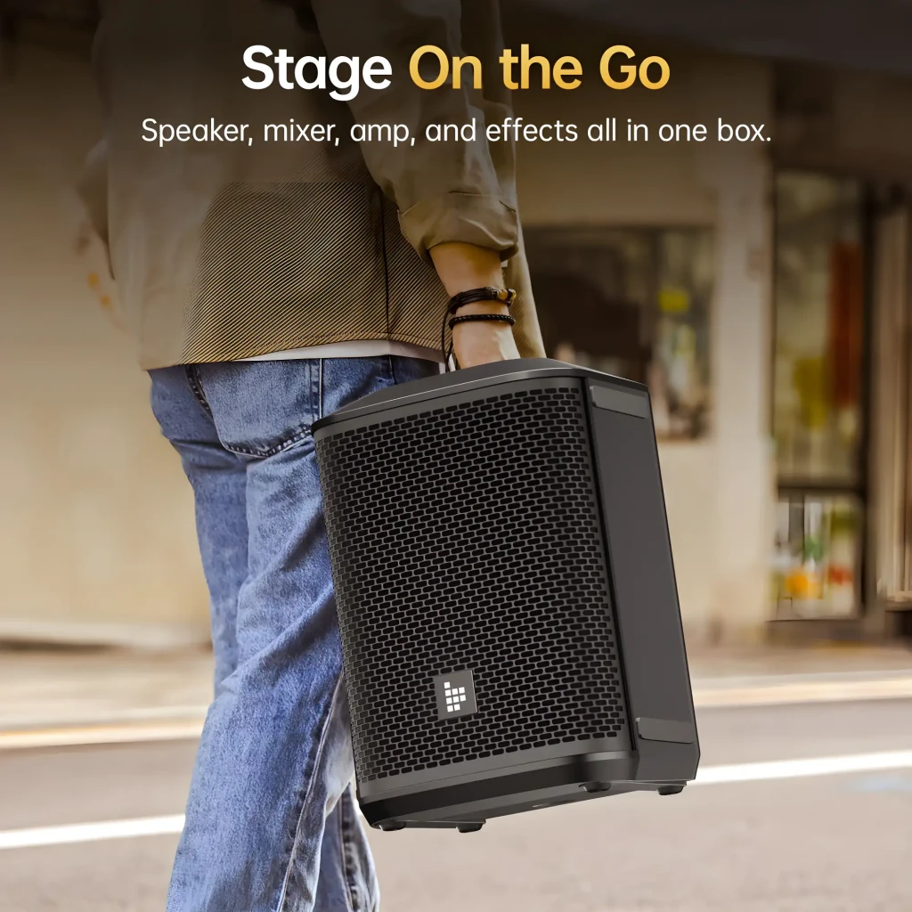 Altavoz PA Tronsmart Hytune S1 portátil, carcasa negra robusta con rejilla metálica frontal, asa lateral para transporte, diseño compacto y profesional