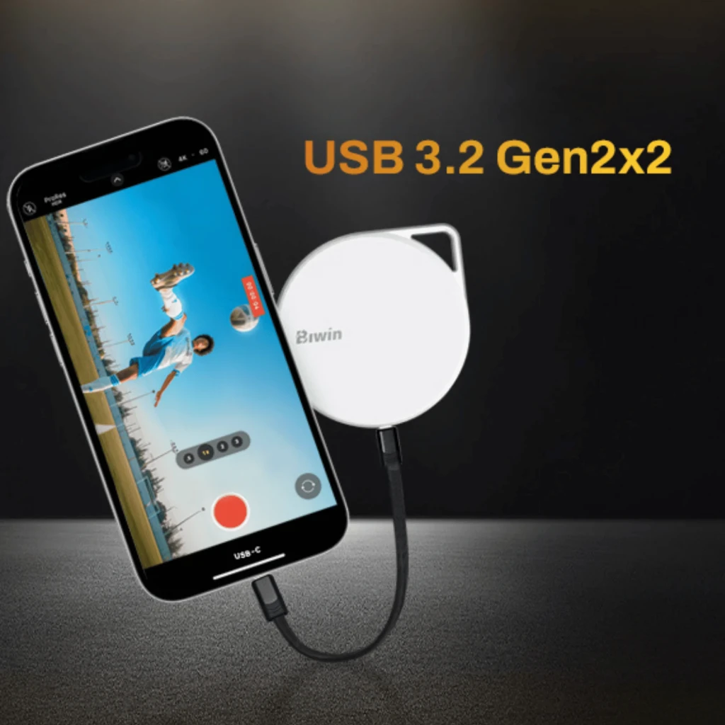 PM2000 Biwin Negro 1TB SSD externo USB-C, diseño circular compacto con cable corto, texto USB 3.2 Gen2x2 en pantalla, ideal para grabación móvil rápida