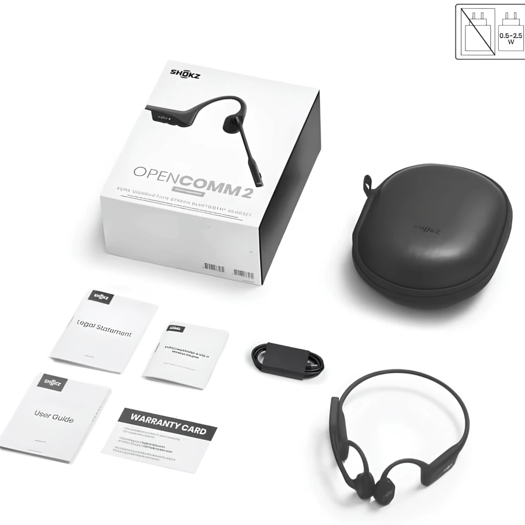Shokz Opencomm 2 2025: auriculares de conducción ósea negros con micrófono boom DSP, diadema flexible, estuche rígido, cable de carga y manuales incluidos