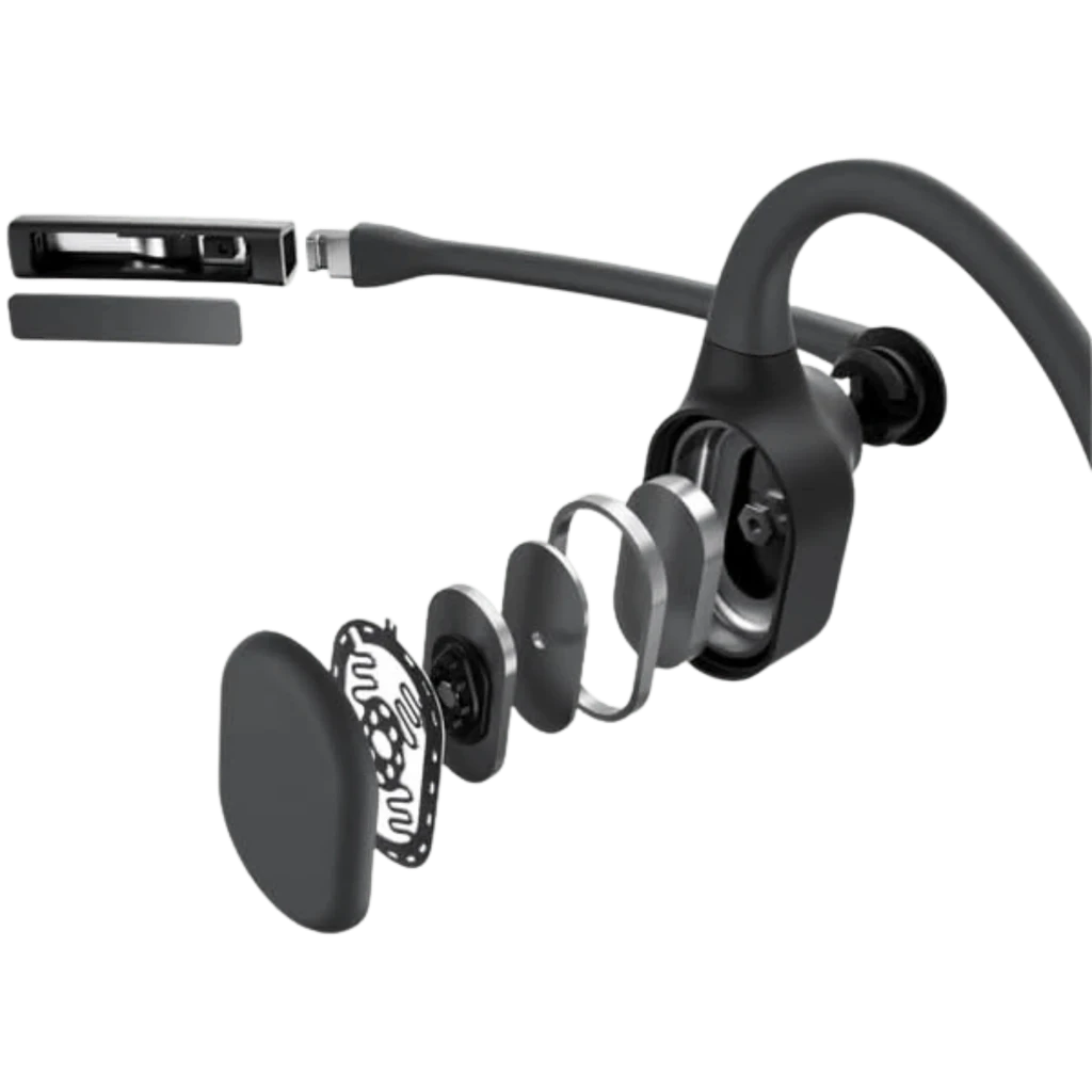 Auriculares Shokz Opencomm 2 2025 con micrófono boom y diseño de conducción ósea; vista explotada de capas internas y transductor abierto en color negro y
