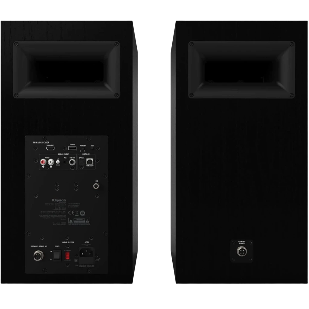 Par de altavoces Klipsch The Nines en negro mate, panel trasero con puertos RCA, óptico, USB, sub out y controles; bocina trasera tipo corneta.