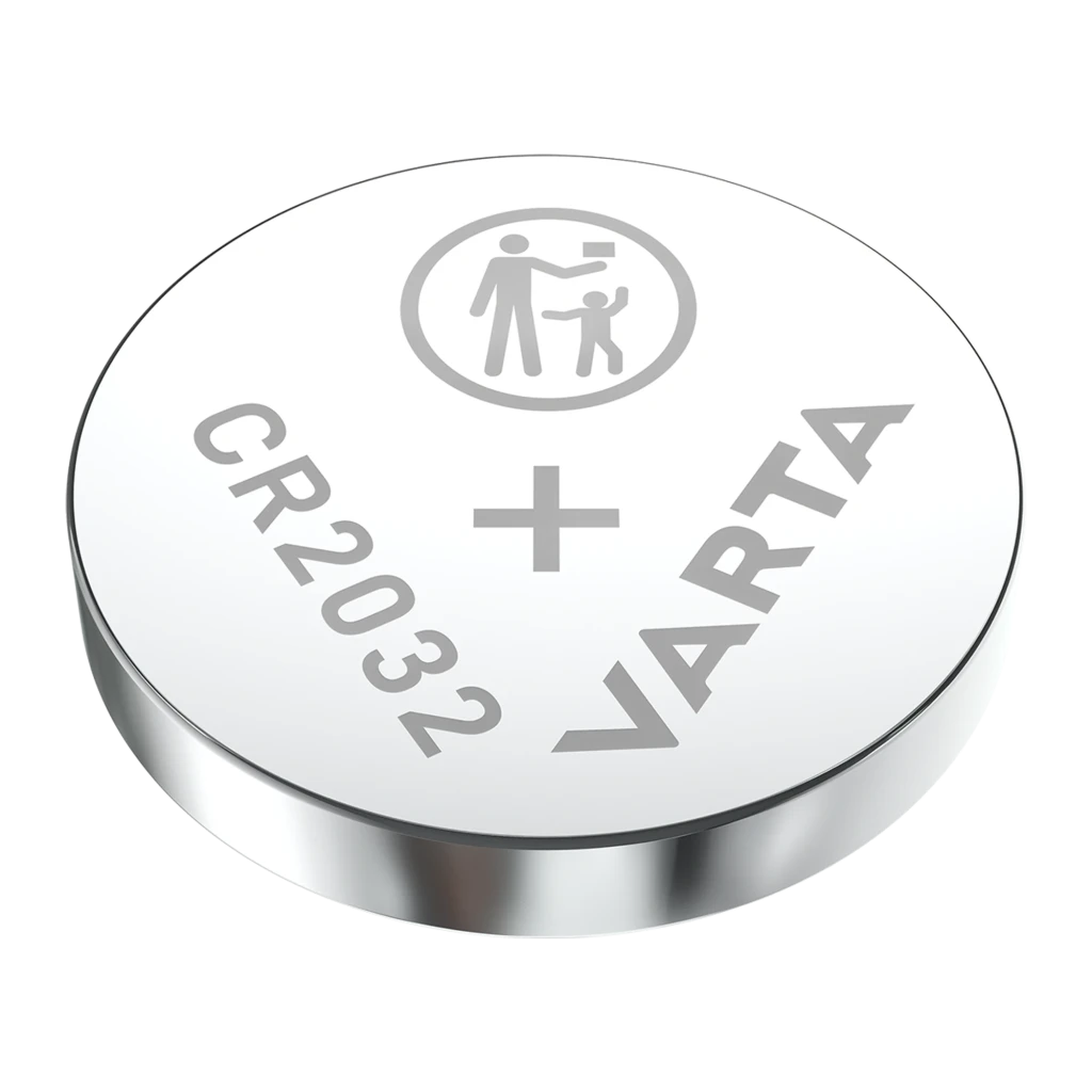 Varta CR2032 Litio plateada, vista en ángulo cara negativa: grosor del canto metálico, CR2032, VARTA e icono infantil