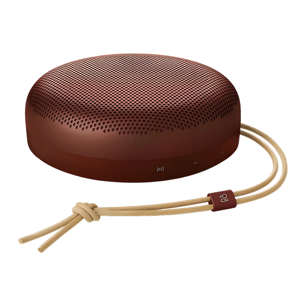 Bang & Olufsen BeoSound A1 3rd Gen Rojo Rústico, vista lateral: rejilla superior, botones frontales y cordón de cuero beige