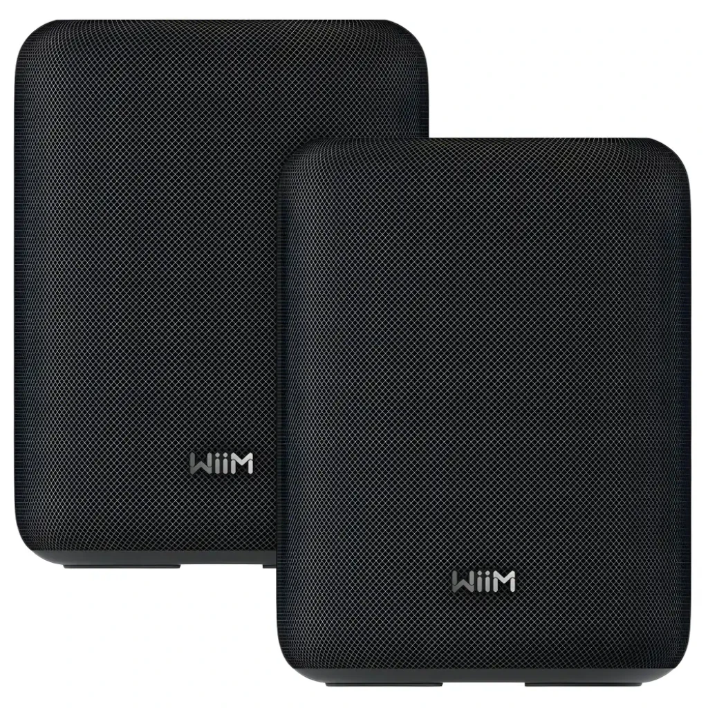 WiiM Sound Lite negro Pack de 2, vista frontal: dos altavoces con rejilla textil negra y logo WiiM centrado