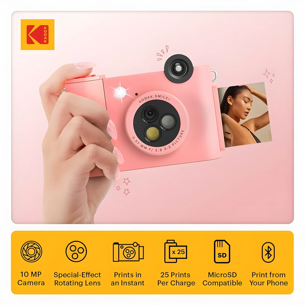 Kodak Instant Camera Smile+ 2x3 rosa, vista frontal: mano sosteniendo la cámara con foto imprimiéndose e iconos de