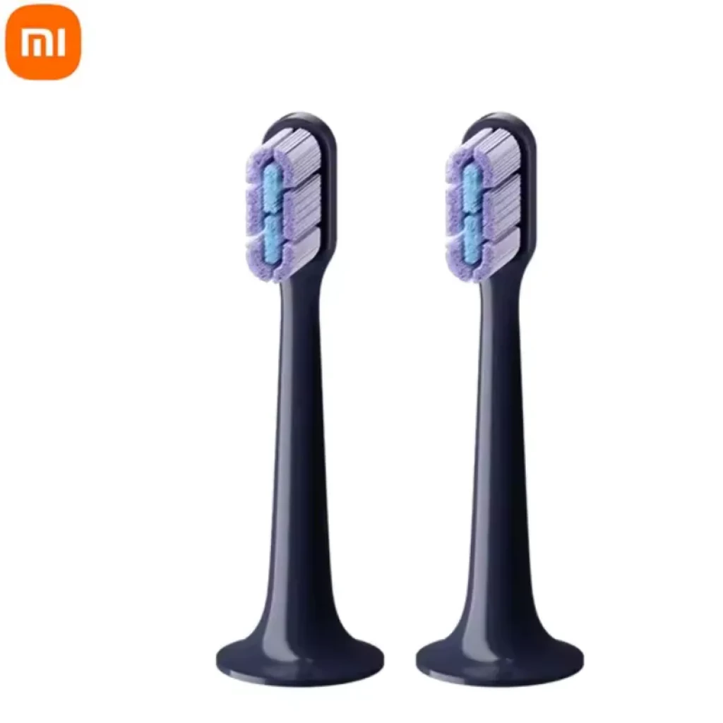 2 cabezales de cepillo Xiaomi Mi Electric Toothbrush T700 en color negro, cerdas suaves bicolor morado y blanco, diseño compacto con base de apoyo redondeada