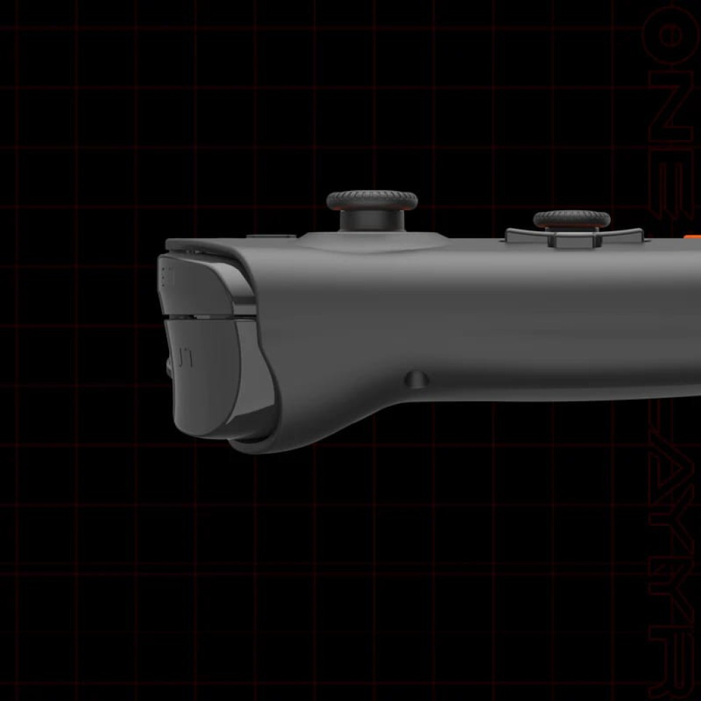 Botón lateral y gatillo negro de consola portátil Onexplayer, acabado mate, diseño ergonómico con joystick y bumper integrados, detalle de borde curvo