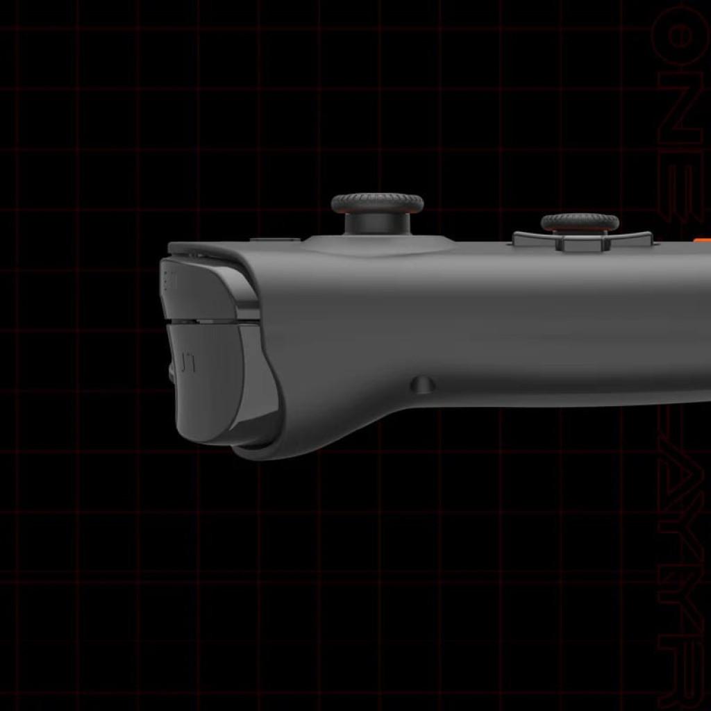 Botón lateral y gatillo negro de consola portátil Onexplayer, acabado mate, diseño ergonómico con joystick y bumper integrados, detalle de borde curvo