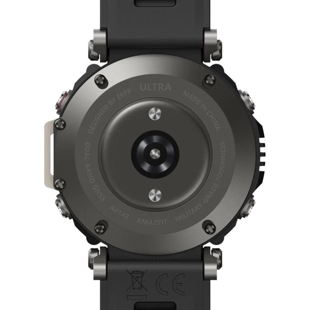 Amazfit T-Rex Ultra Negro desprecintado, vista trasera del reloj: carcasa robusta, sensor óptico central, tornillos visibles y correa de silicona negra