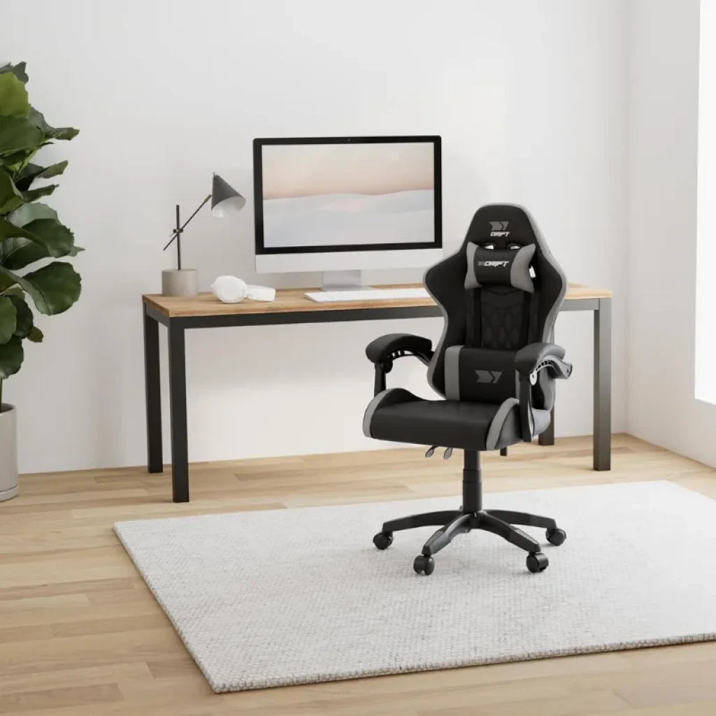 Silla gaming DRIFT DR35 Negro, Gris con cojín lumbar y cervical, reposabrazos, base con ruedas y tapizado bicolor; diseño ergonómico frente a escritorio