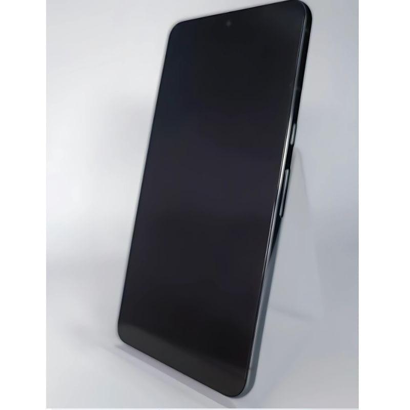 Smartphone noir Obsidienne au grand écran bord à bord, bords fins, boutons latéraux argentés. Modèle 5G 8Go/128Go, reconditionné en excellent état.