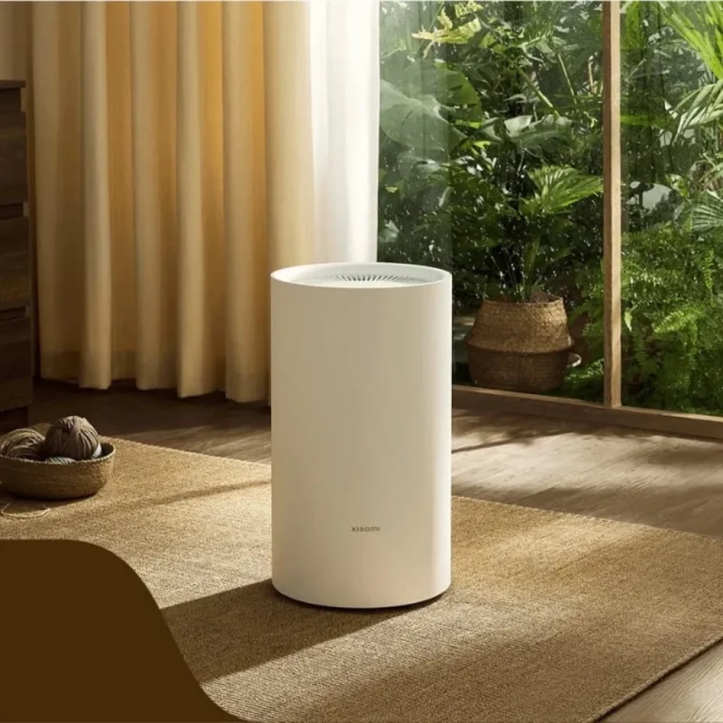 Xiaomi Smart Dehumidifier Lite Branco cilíndrico, minimalista, cor branca mate, grelha superior circular e corpo liso; design compacto para interiores modernos