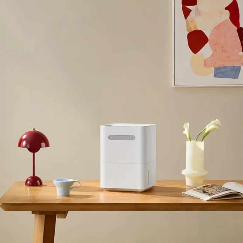 Smartmi Evaporative Humidifier 3 Lite Humidificateur blanc compact, design minimal, bouton frontal, réservoir visible, posé sur table en bois, style moderne
