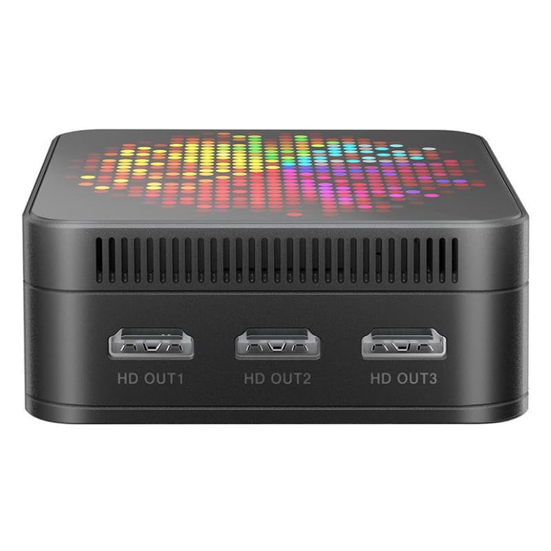 HSI-100 Mini PC con panel LED multicolor superior, tres puertos HDMI frontales HD OUT, diseño compacto en negro con ventilación lateral