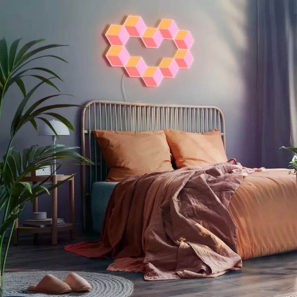 Paneles hexagonales RGBIC con brillo gradiente rosa y naranja, montaje modular en pared, forma corazón, iluminación inteligente WiFi y Bluetooth