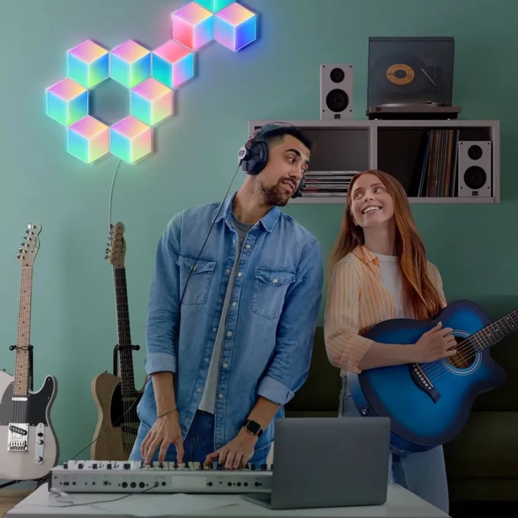 Paneles hexagonales RGBIC modulares con iluminación multicolor dinámica en pared. Control por Wifi y Bluetooth, ideal para ambientar música y gaming.