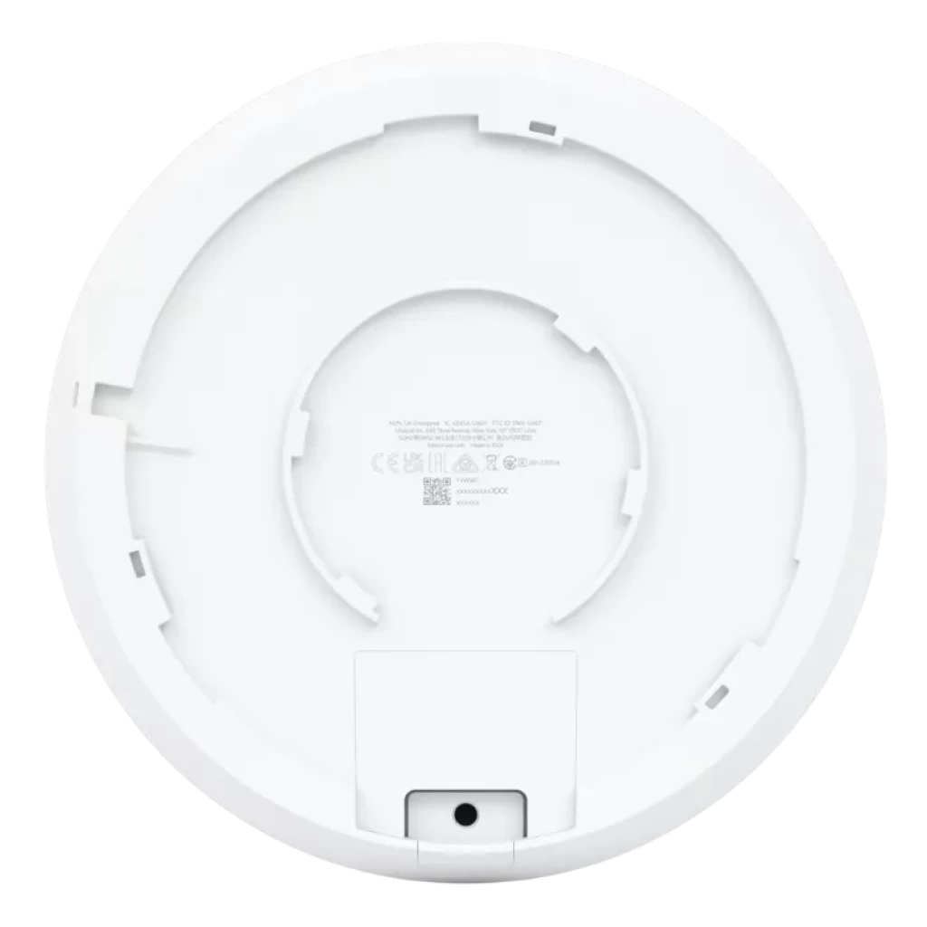 Arrière de l'Ubiquiti U6 Enterprise : couvercle circulaire blanc avec support de montage, étiquettes CE et port inférieur pour câblage PoE