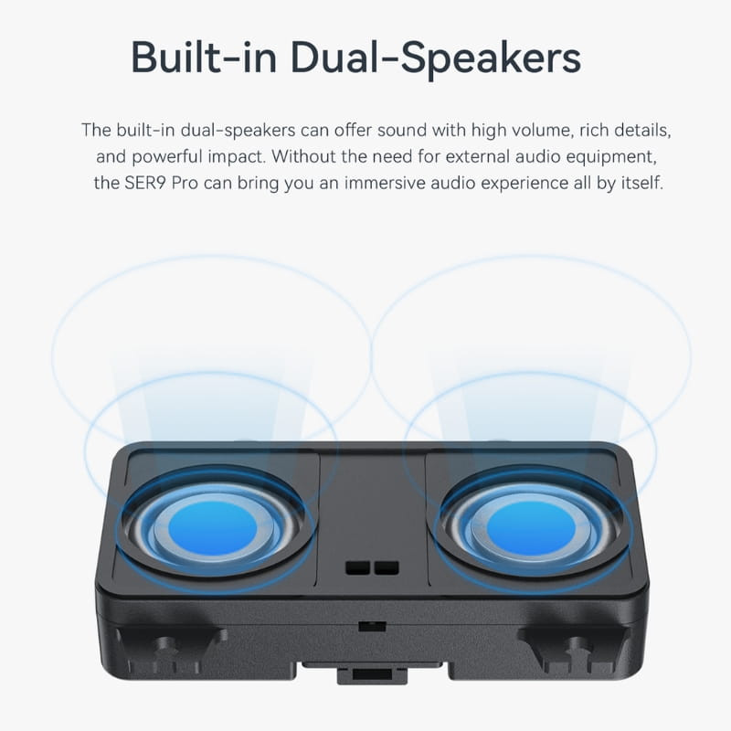 Módulo de altavoces duales integrados con rejillas circulares azules, diseño compacto rectangular en negro, destaca efecto estéreo y potencia sonora