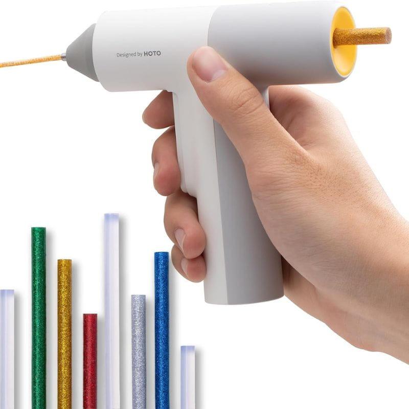 HOTO QWRJQ002 Pistole à silicone chaud blanche, design ergonomique, buse fine, bâton pailleté doré inséré, compatibles avec bâtons colorés scintillants