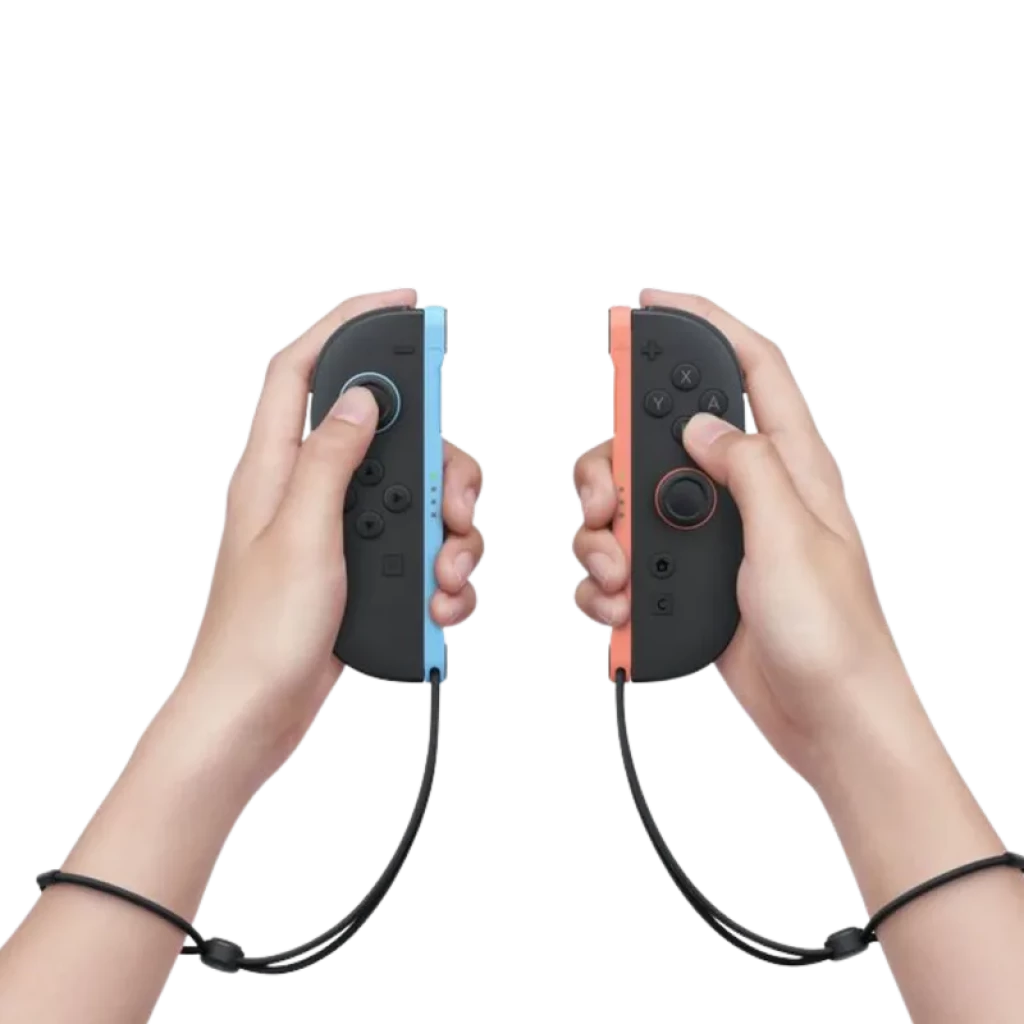 Controles Joy-Con do Nintendo Switch 2 em preto com laterais azul e vermelho, presos por alças, mostrados nas mãos para jogo portátil e multijogador.