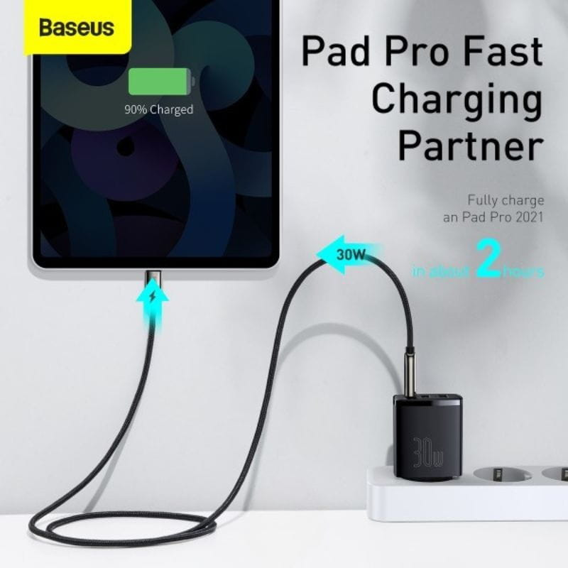 Baseus Compact Quick Charger 30W Blanco - Cargador de pared 2xUSB-A 1xUSB-C ejemplo de carga rápida en una tablet