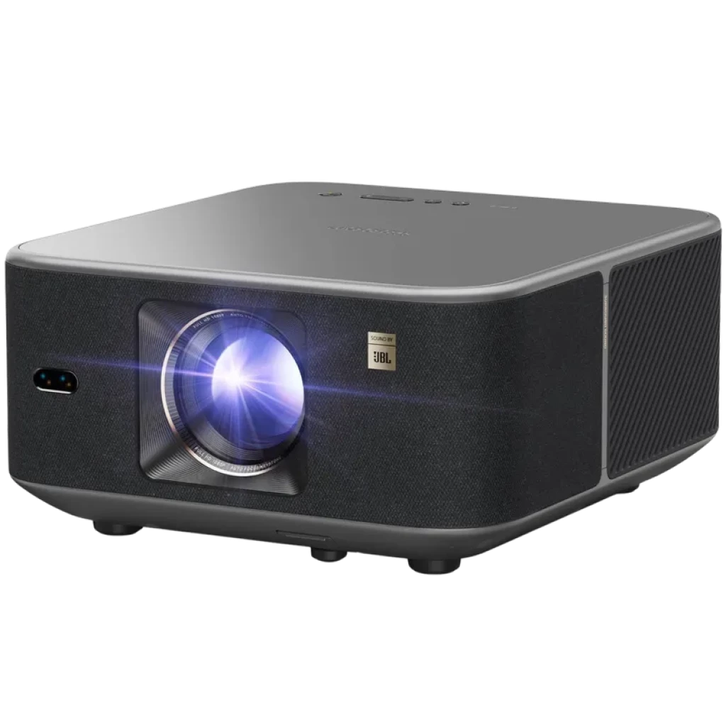 Proyector Yaber K3 Pro 1080P con lente frontal iluminada, cuerpo gris compacto, rejillas laterales y logo JBL en el panel, diseño moderno y robusto