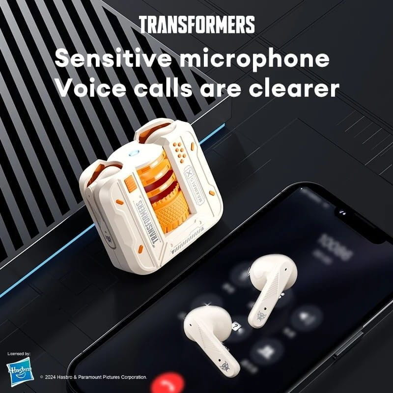 Transformers TF-T71 Creme: estojo branco com detalhes laranja e dourados, design futurista, fones sem fio brancos, microfone sensível para chamadas claras.