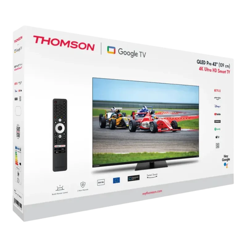 Caja de Thomson 43QG7C14 con TV 43 pulgadas QLED 4K Ultra HD, Google TV y Wi‑Fi; incluye control remoto. Diseño negro con imagen vibrante en pantalla.