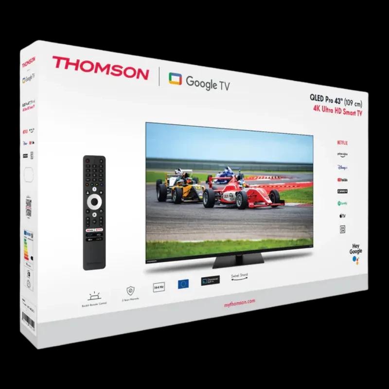 Caja de Thomson 43QG7C14 con TV 43 pulgadas QLED 4K Ultra HD, Google TV y Wi‑Fi; incluye control remoto. Diseño negro con imagen vibrante en pantalla.