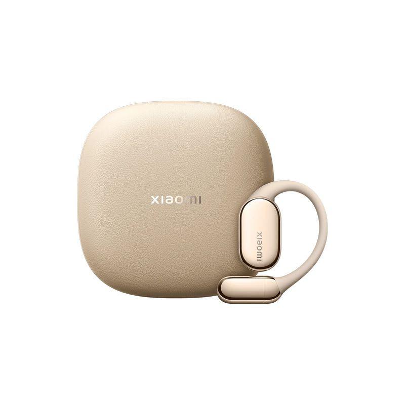 Xiaomi OpenWear Stereo Pro dorado arena con estuche compacto beige, diseño open-ear curvo, acabado mate y detalles metálicos, compatible con ANC