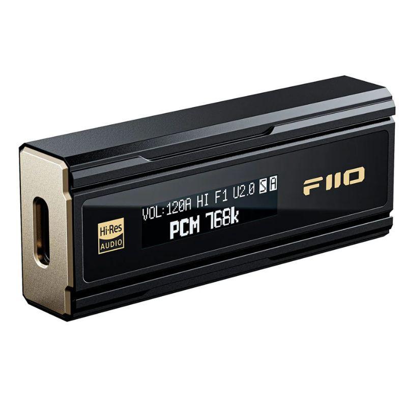 FiiO KA5 - Amplificador / DAC portátil Negro: panel frontal dorado con dos salidas de audio, 3.5 mm y 4.4 mm balanceada, borde negro robusto y compacto.