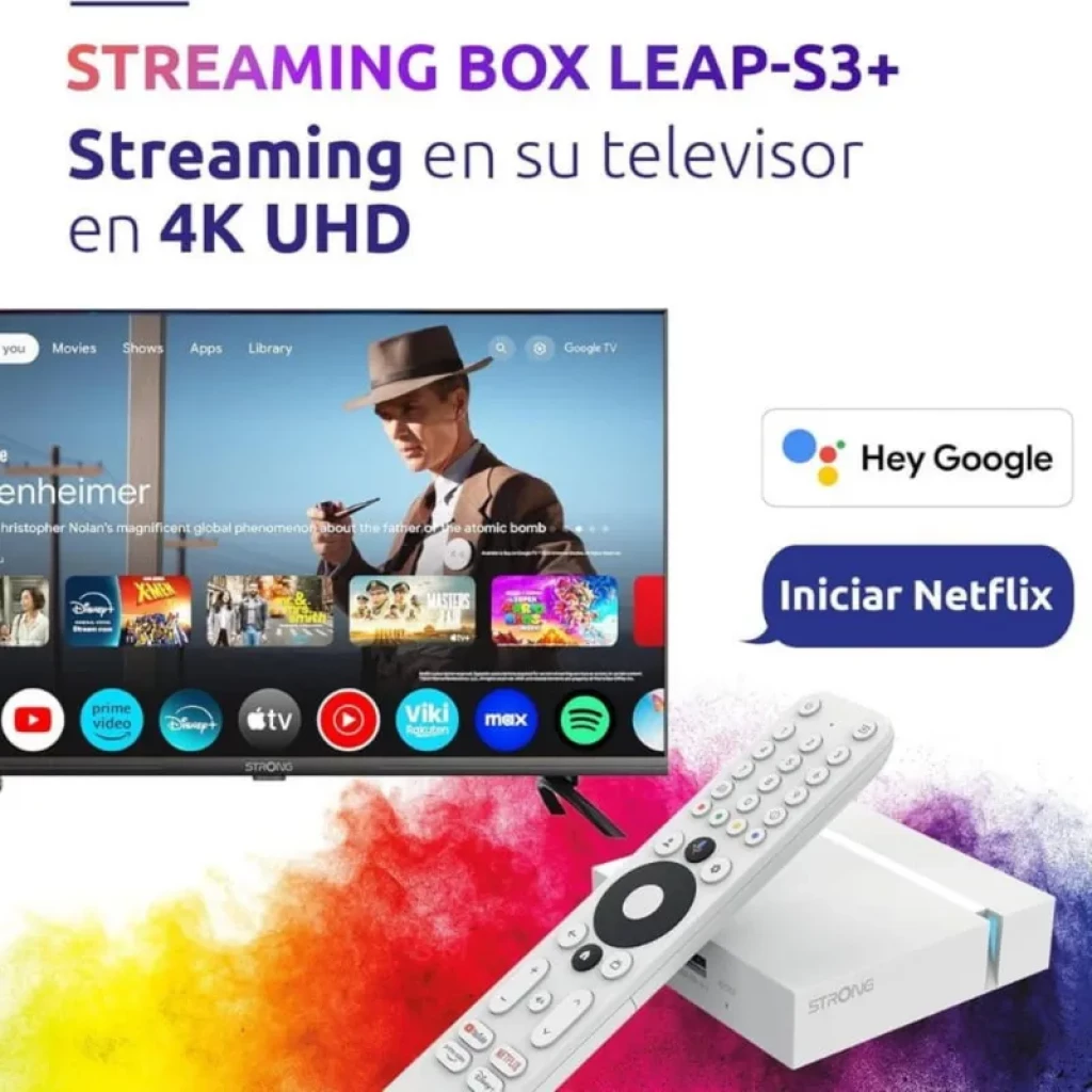 Control remoto blanco con botones dedicados Hey Google y Netflix junto a caja Strong Leap-S3+ V2; promoción de streaming 4K UHD en televisor con apps visibles