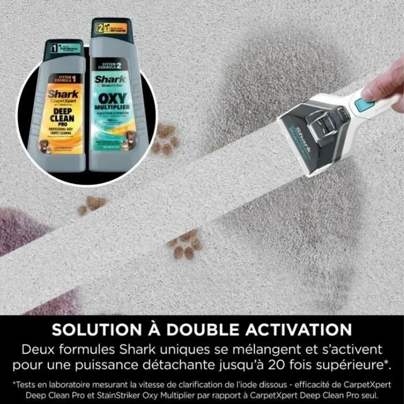 Shark PX200EUT Aspiradora de tapicería: cabezal manual aplicando dos fórmulas Deep Clean y OXY sobre manchas en tela, chorro dirigido y limpieza profunda