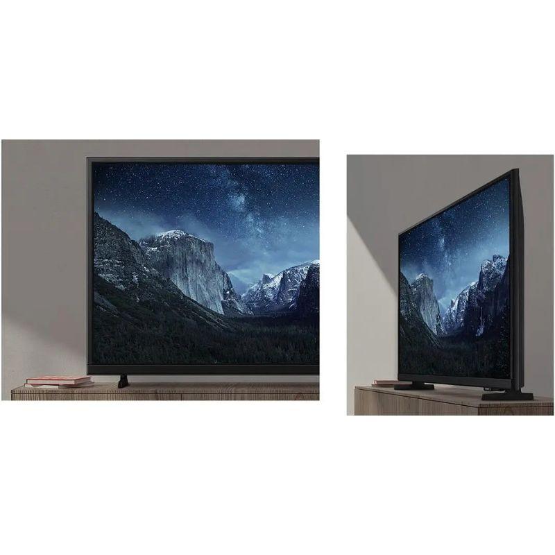 Samsung TU32F6005FK 32 Full HD LED Smart TV Preto, imagem real sobre uma mesa vista de frente e de lado