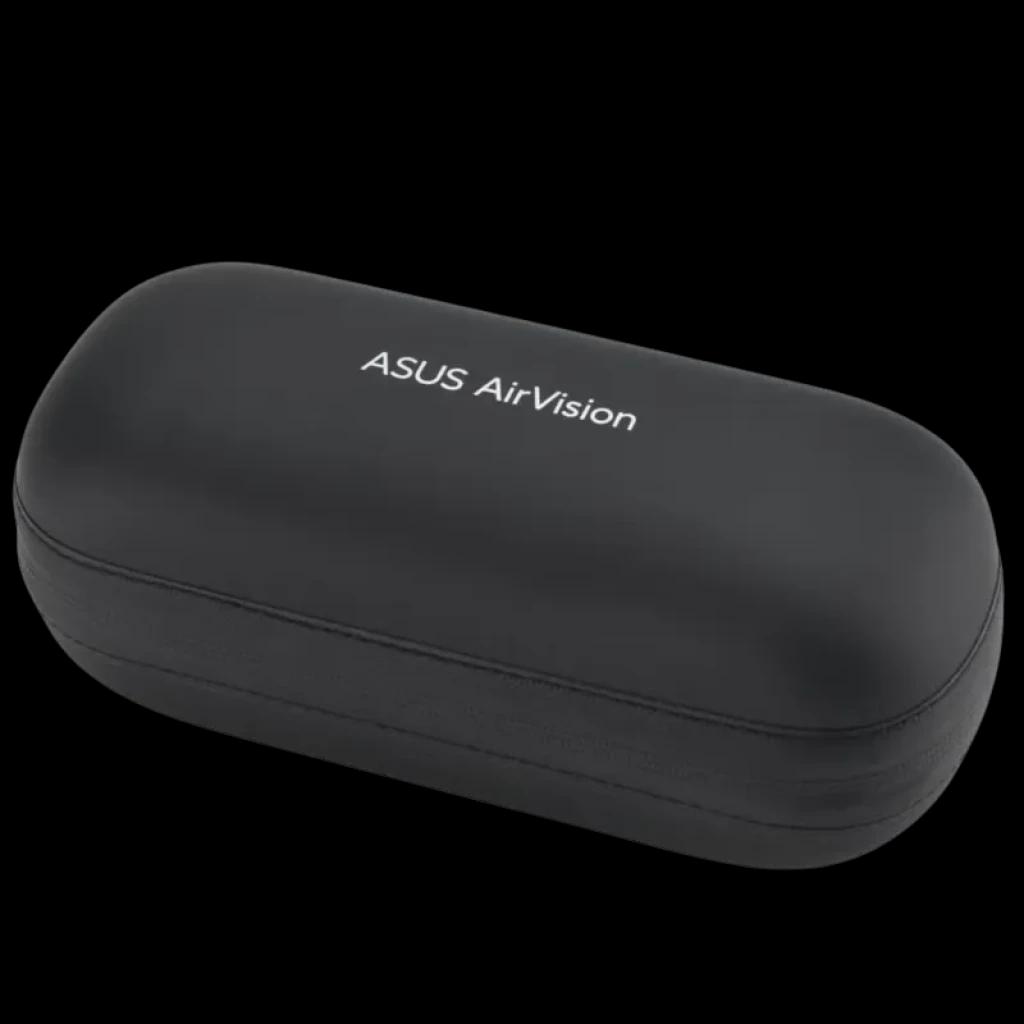 Étui rigide noir ASUS AirVision, compact et arrondi, avec logo blanc sur le dessus; fermeture zippée pour protéger les lunettes intelligentes M1