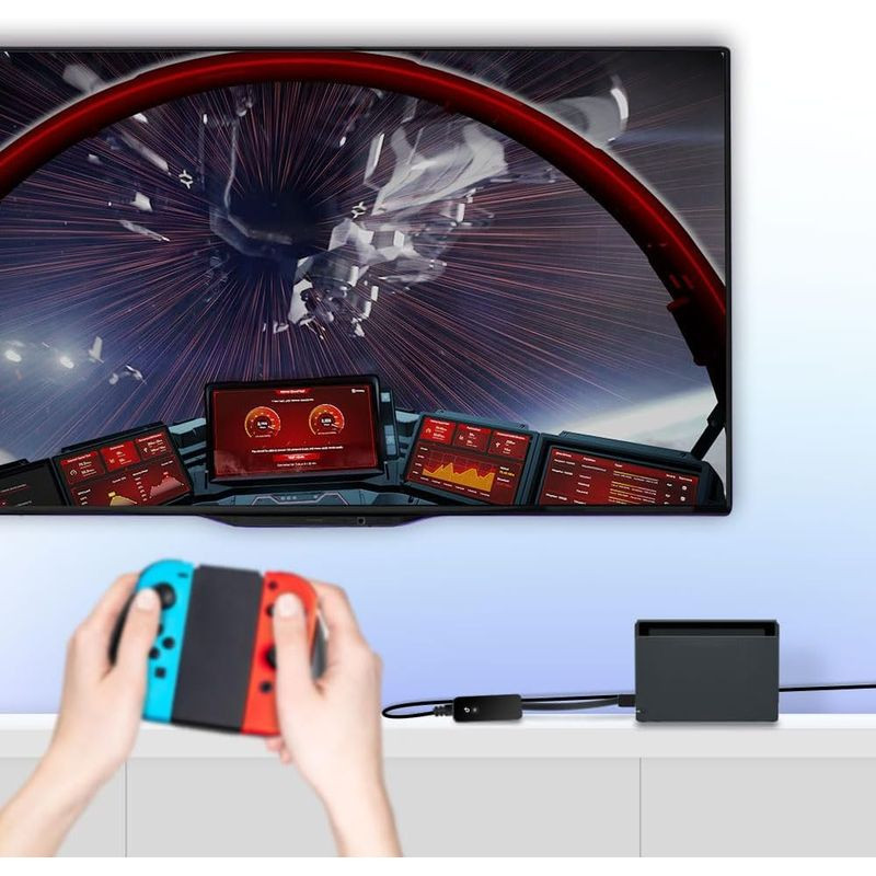 Adaptador TP-Link UE306 conectado a dock de consola, con cable Ethernet y USB 3.0; pantalla muestra juego en movimiento a alta velocidad.