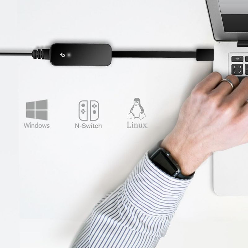 TP-Link UE306: adaptador USB 3.0 a Ethernet Gigabit negro con indicador LED, cable integrado y compatibilidad con Windows, Nintendo Switch y Linux.